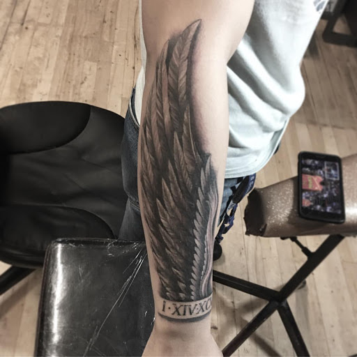 Find tattoo for dad ideas for your next unique tattoo in Stockton at Stockton Tattoo & Piercing