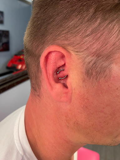 Explore mic tattoo ideas, creative tattoo ideas in Palm Harbor, available at Angry Owl Tattoo and Piercing