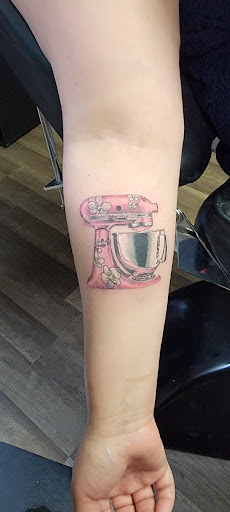 Explore small tattoo cover up ideas, creative tattoo ideas in Largo, available at Alchemy Tattoos and Body Piercings