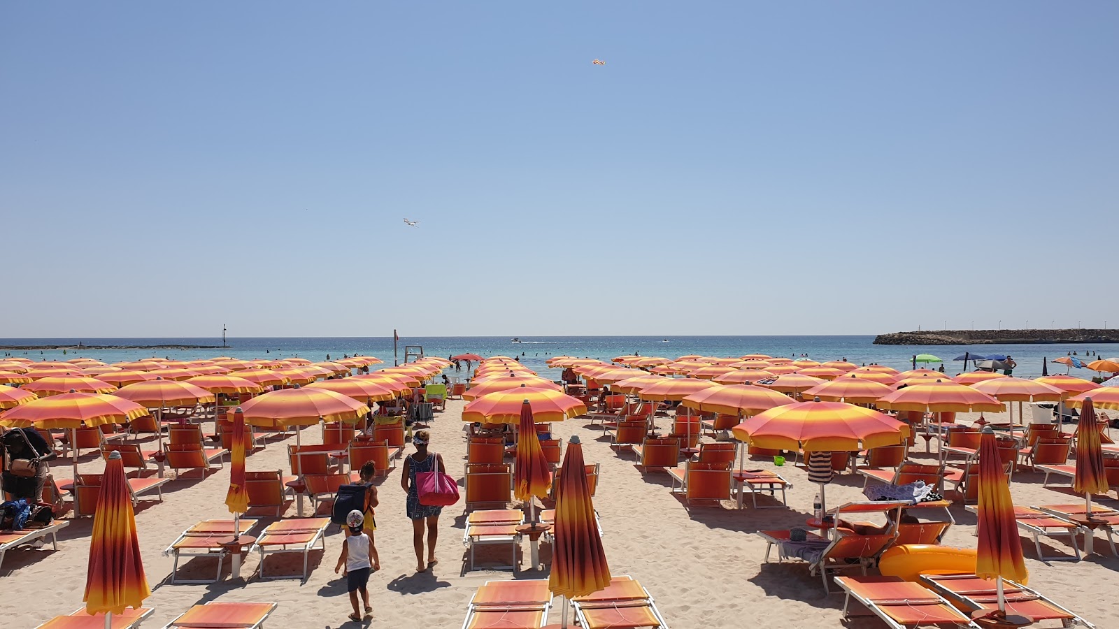 Fotografija Plaža Torre San Giovanni priljubljeno mesto med poznavalci sprostitve