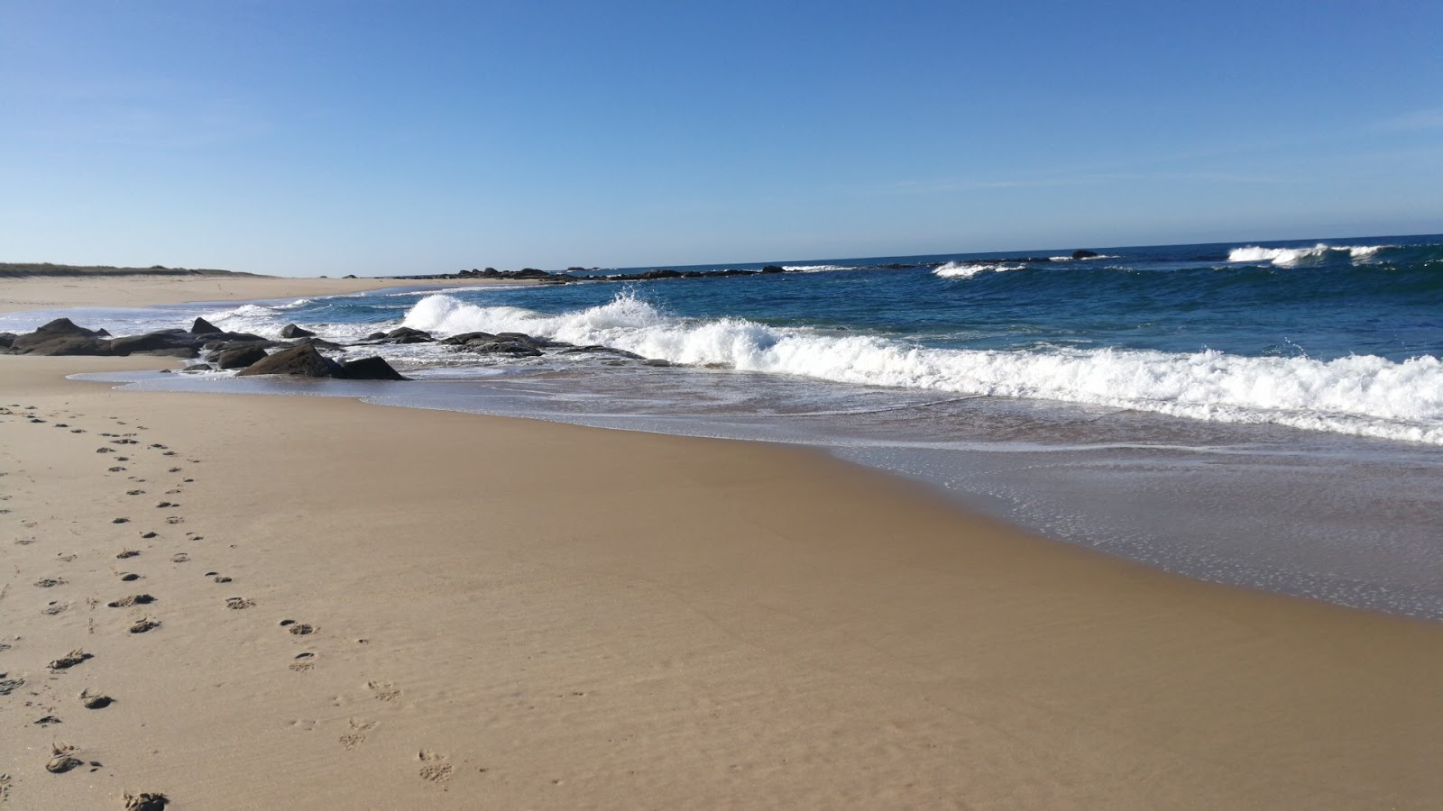 Foto van Seixo beach met helder zand oppervlakte