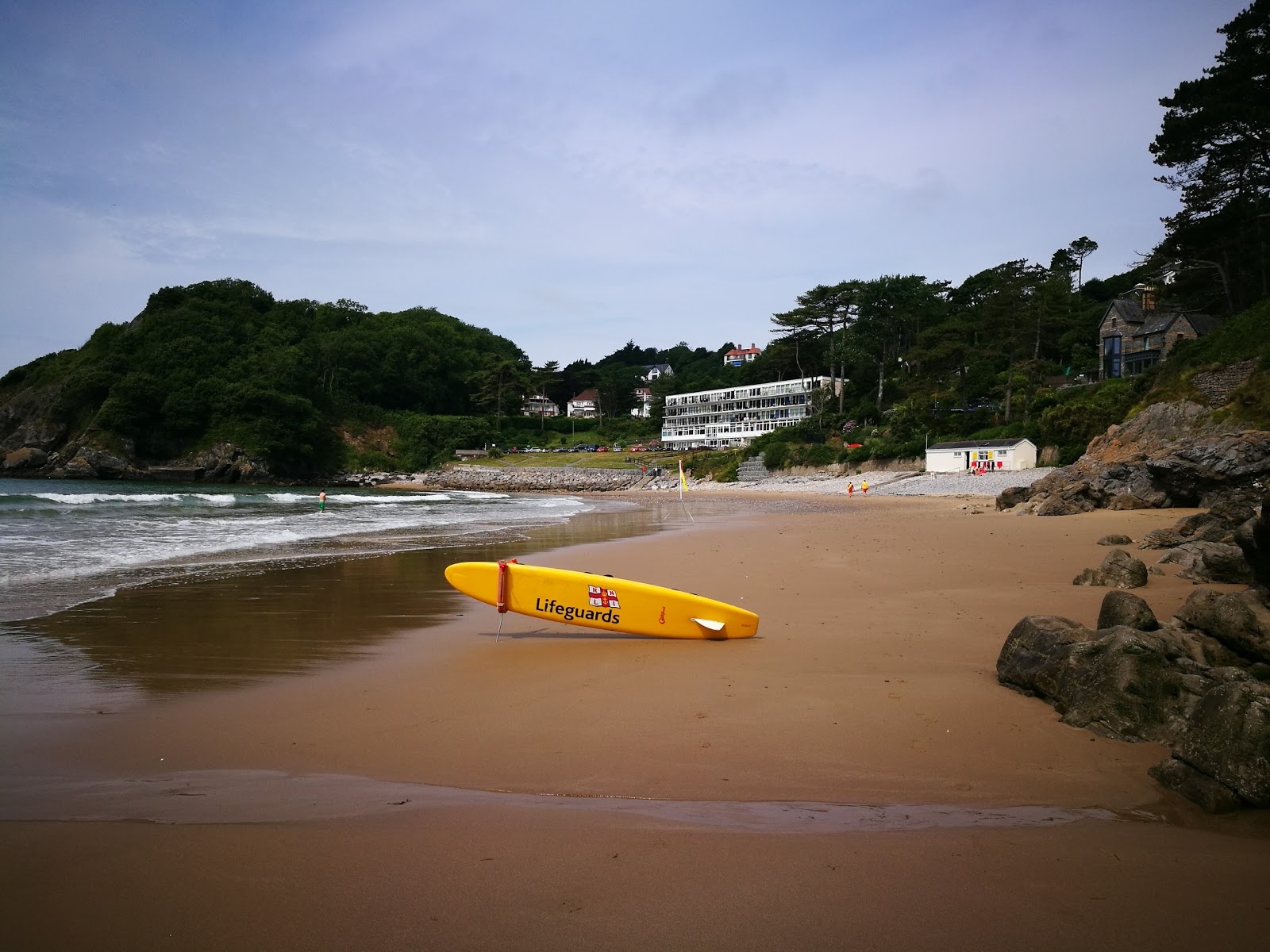 Foto di Caswell Bay beach sorretto da scogliere