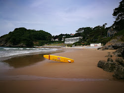Foto di Caswell Bay beach sorretto da scogliere