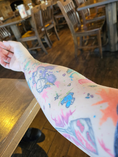 Explore colorful tattoo ideas, creative tattoo ideas in Loganville, available at Not Of This World Tattoo & Piercing