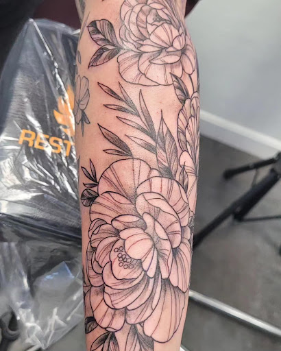 Explore small dinosaur tattoo ideas, creative tattoo ideas in Worcester, available at Elegance Piercing & Tattoo Inc.