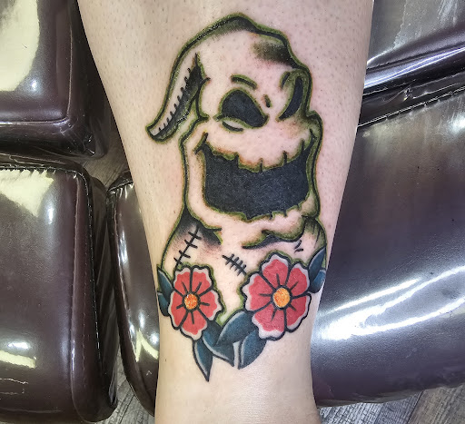 Explore wedding ring tattoo ideas for him, creative tattoo ideas in Clarksville, available at Dark Raine Tattoo