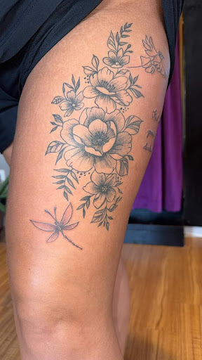 Find flower thigh tattoo ideas for your next unique tattoo in Beaverton at In The Mix Tattoo Studio LLC