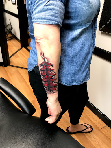 Explore cool hand tattoo ideas, creative tattoo ideas in Tarpon Springs, available at Legendary Custom Tattoos and Piercings