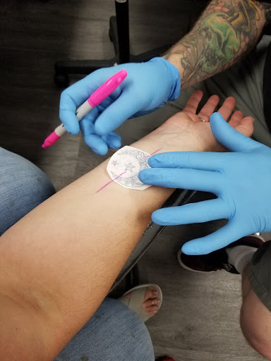 Find angel hand tattoo ideas for your next unique tattoo in Manteca at Union Tattoo & Piercing