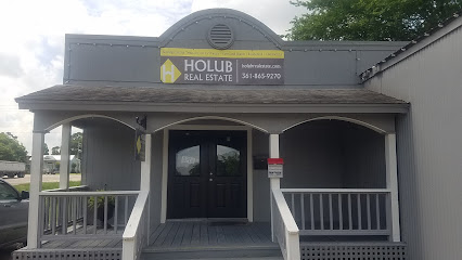 HOLUB REAL ESTATE LLC /FLATONIA OFFICE