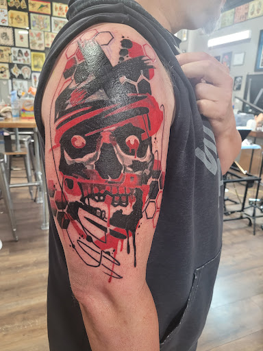 Explore spine tattoo ideas, creative tattoo ideas in Mount Juliet, available at Division Street Tattoo Company