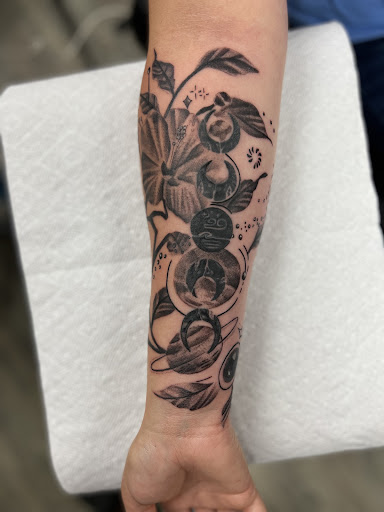 Explore tiger lily tattoo ideas, creative tattoo ideas in Schaumburg, available at Urban Rebels Ink