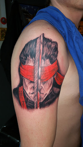 Explore minimalist tattoo ideas for men, creative tattoo ideas in Foley, available at Black Sheep Custom Tattoos and Piercings