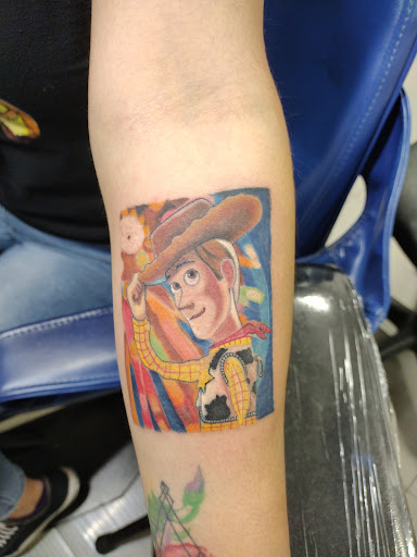 Explore afro tattoo ideas, creative tattoo ideas in Los Angeles, available at One Way Tattoo Shop