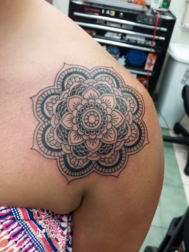 Explore tattoos for son ideas, creative tattoo ideas in Hampton, available at Blue Horseshoe Tattoo and Body Piercing