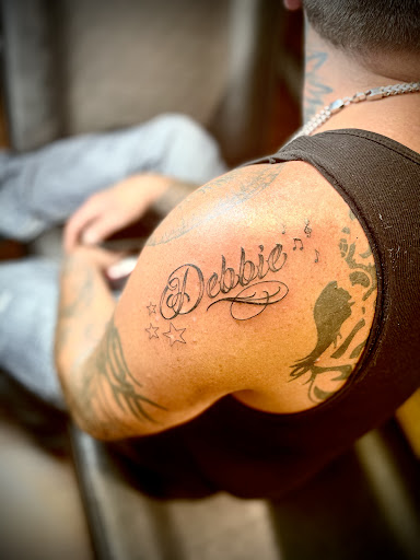 Explore lamb tattoo ideas, creative tattoo ideas in Tannersville, available at Sacred Ink Studio
