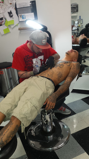 Tattoo Shop «Ink Slingers», reviews and photos, 1355 E Kearney St, Springfield, MO 65803, USA