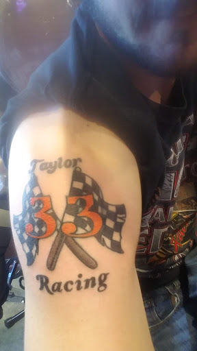 Explore vertical tattoo ideas, creative tattoo ideas in Franklin, available at Battleground Tattoo Parlour