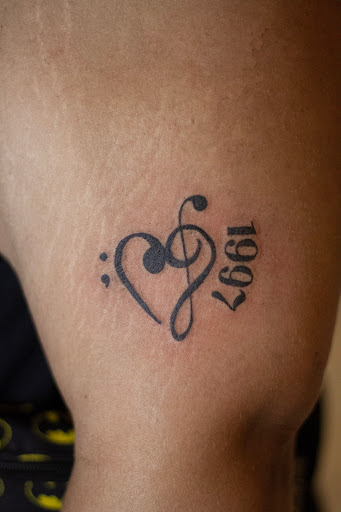 Explore mom dad tattoo ideas, creative tattoo ideas in Bronx, available at Asylum Tattoo Studio