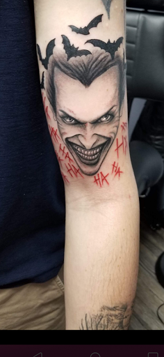 Explore music tattoo ideas men, creative tattoo ideas in Knoxville, available at Archangel Custom Ink Tattoo & Piercing