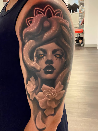 Explore bee tattoo ideas for women, creative tattoo ideas in Bridgeport, available at Pike Street Studios Tattoo and Body Piercing