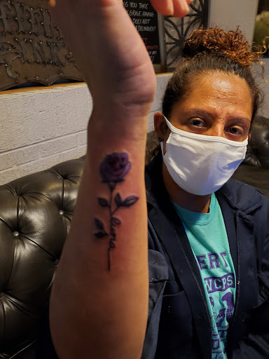 Explore enlightenment tattoo ideas, creative tattoo ideas in Altus, available at Attitudes Ink