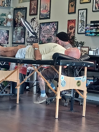 Explore hand tattoos men ideas, creative tattoo ideas in Winter Haven, available at Angry Elephant Tattoos Winter Haven
