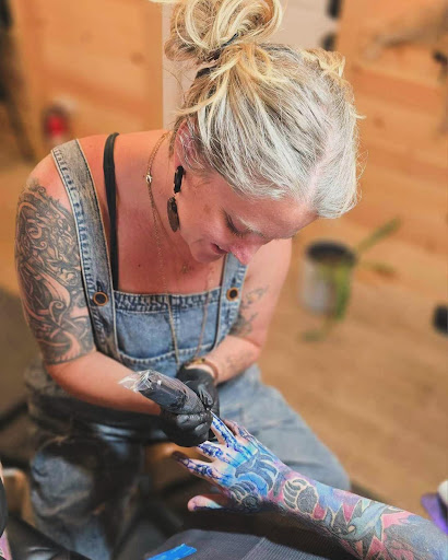 Explore tree sleeve tattoo ideas, creative tattoo ideas in Florissant, available at Lone Jack Tattoo Company