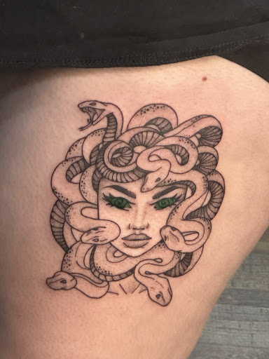 Explore arm blackout tattoo ideas, creative tattoo ideas in Clarksville, available at Dark Raine Tattoo