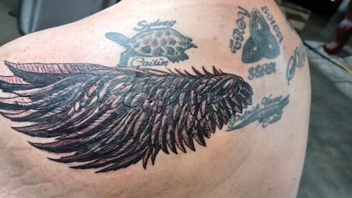 Explore daughter tattoo ideas for dad, creative tattoo ideas in Anchorage, available at HardLines Tattoo & Design