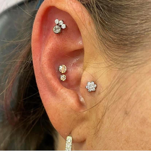 Explore stitch and angel tattoo ideas, creative tattoo ideas in Aledo, available at Elevated Tattoo & Piercing