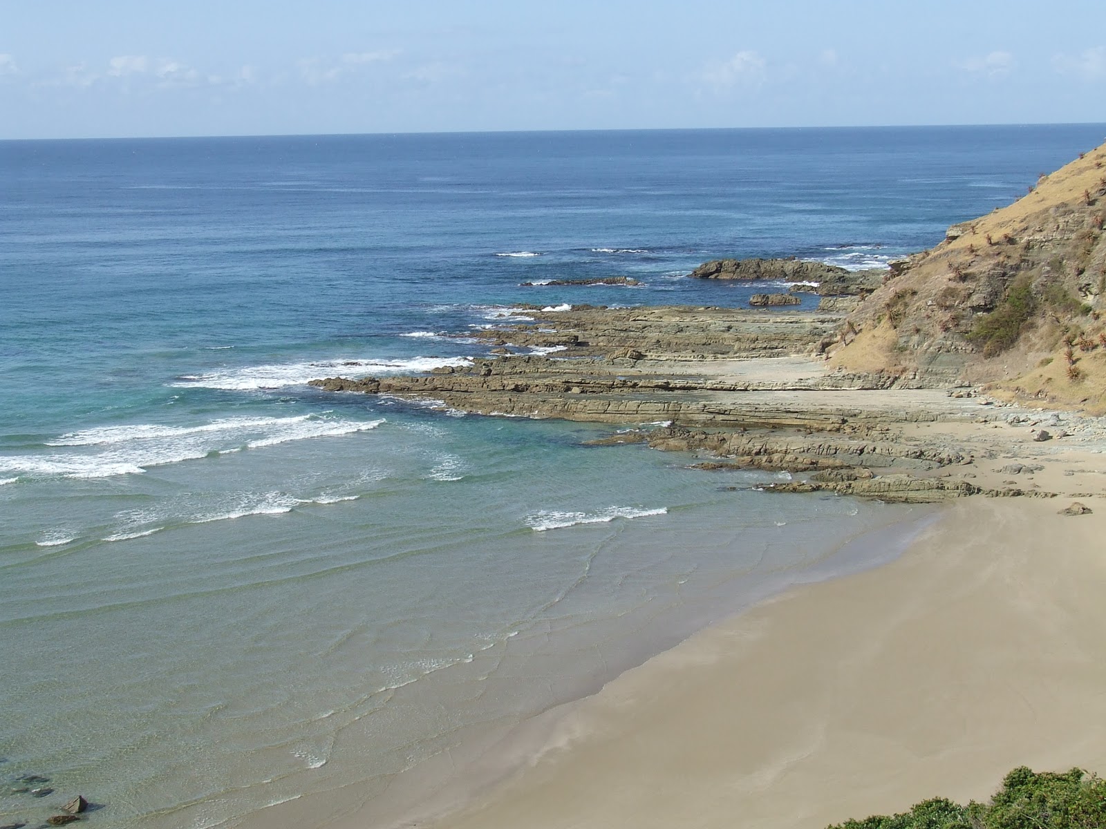 Fotografija Presley Bay z svetel pesek površino