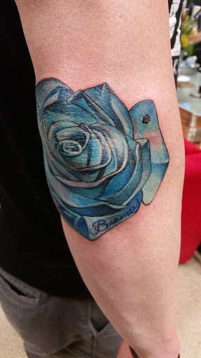Explore dahlia tattoo ideas, creative tattoo ideas in Dixon, available at Algood Ink Tattoo
