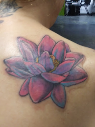 Explore flower tattoo ideas, creative tattoo ideas in Dallas, available at Freak Show Studio