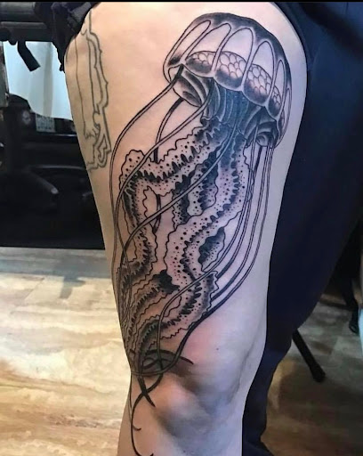 Explore trident tattoo ideas, creative tattoo ideas in Goose Creek, available at Red Kirin Tattoo