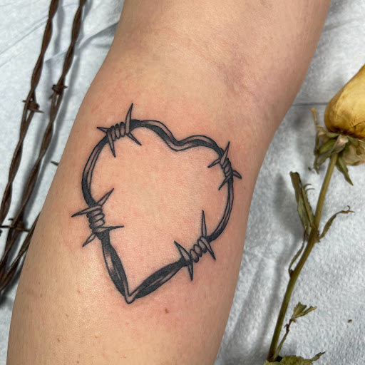 Explore tattoo ideas on breast, creative tattoo ideas in Buffalo, available at True Gloom Tattoo Studio