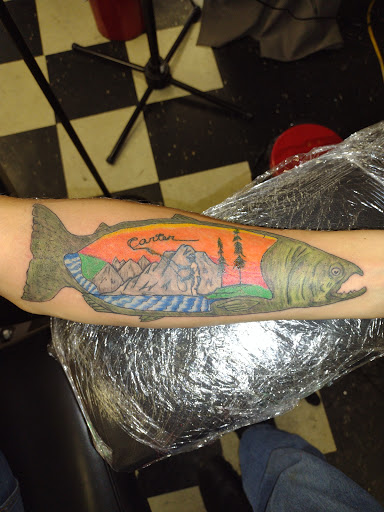 Explore tattoo cover up ideas for guys, creative tattoo ideas in Owosso, available at Twisted ink tattoo