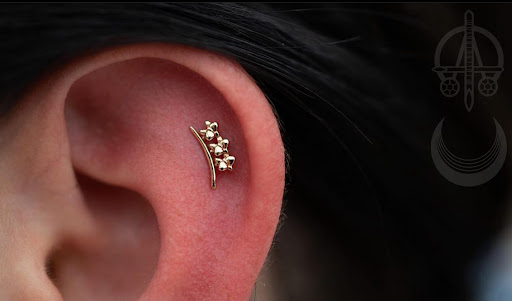 Explore lamb of god tattoo ideas, creative tattoo ideas in Roanoke, available at Clove Piercing & Fine Jewelry