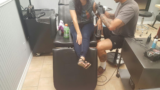 Tattoo Shop «magnum opus tattoo company», reviews and photos, 1817 Padre Blvd #4, South Padre Island, TX 78597, USA