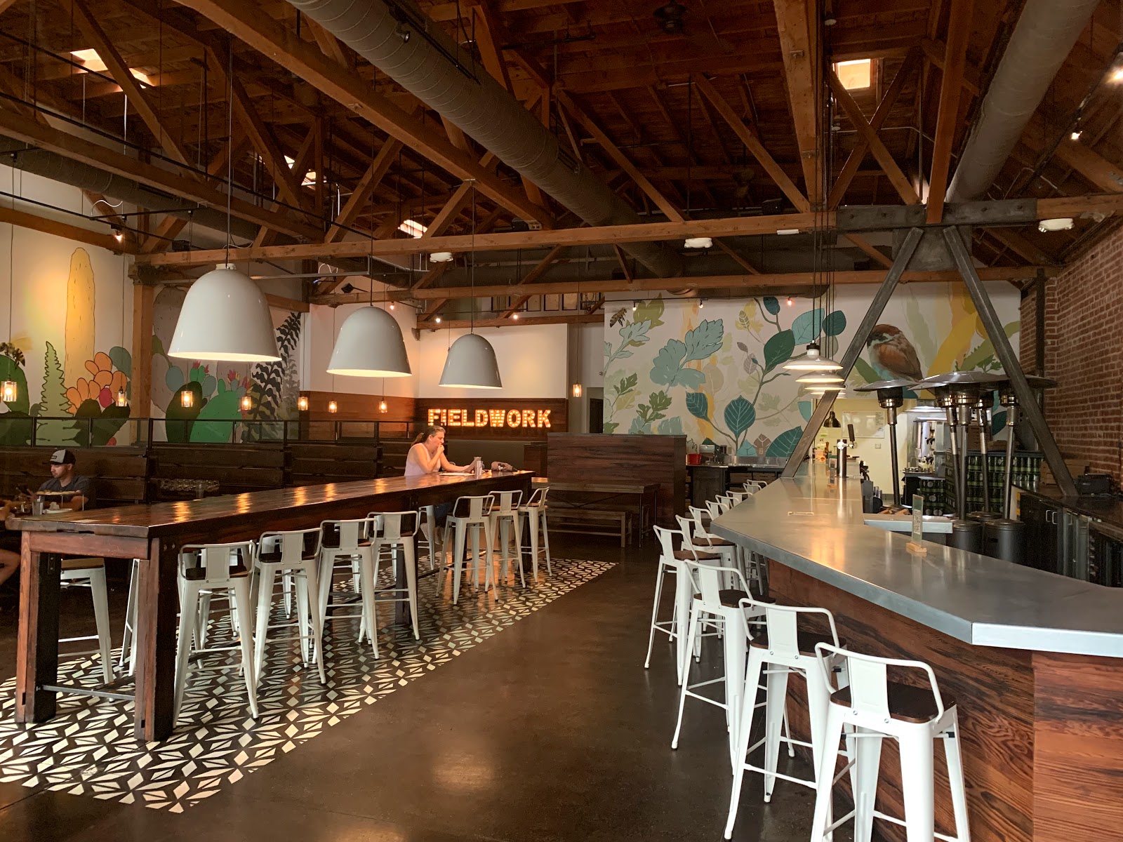 Beer taps lined up on a bar