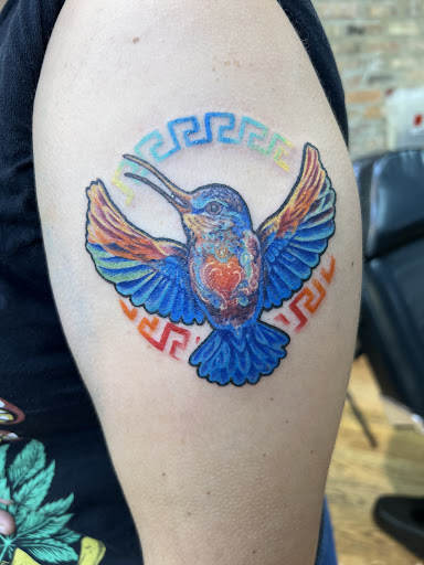 Explore hour glass tattoo ideas, creative tattoo ideas in Chicago, available at Ageless Arts Tattoo and Body Piercing