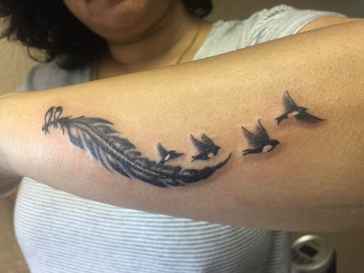 Explore forearm watercolor tattoo ideas, creative tattoo ideas in Keyport, available at Taboo Tattoos