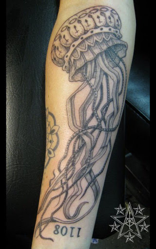 Tattoo Shop «AWOL Custom Tattooing Llc», reviews and photos, 1780 W Sherman Blvd, Muskegon, MI 49441, USA