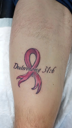 Explore lower back cover up tattoo ideas, creative tattoo ideas in Easley, available at Amber Island Tattoo
