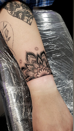 Explore scarification tattoo ideas, creative tattoo ideas in Orange, available at Three Diamonds Tattoo