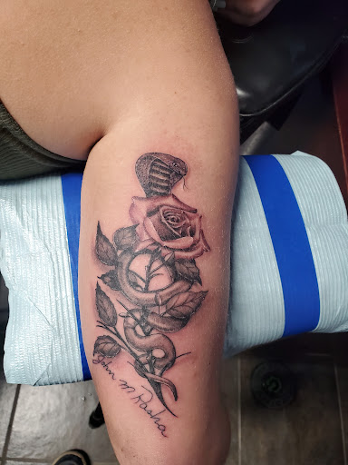 Explore grandfather tattoo ideas, creative tattoo ideas in Fort Gratiot, available at Stained Glass Tattoo & Body Piercing