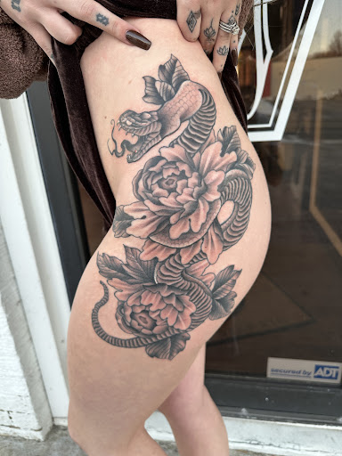 Find tattoo ideas for tummy tuck scars for your next unique tattoo in Erie at Wayward Tattoo Studio