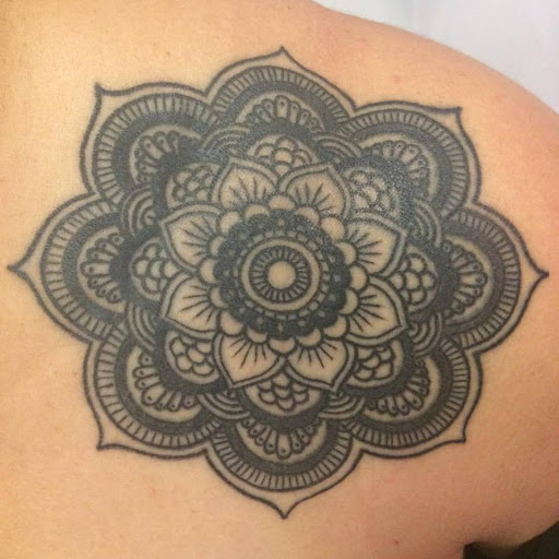 Explore tattoo ideas for collarbone, creative tattoo ideas in Chapel Hill, available at Golden Falcon Tattoo and Piercing