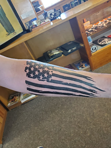 Explore swimming tattoo ideas, creative tattoo ideas in Anchorage, available at Anchorage Tattoo Studio