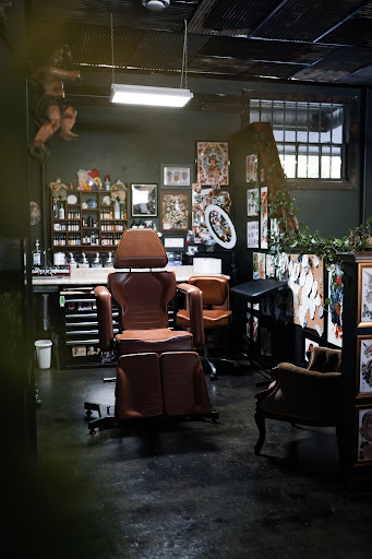 Explore dog tattoo ideas for men, creative tattoo ideas in Paducah, available at Third Moon Tattoos
